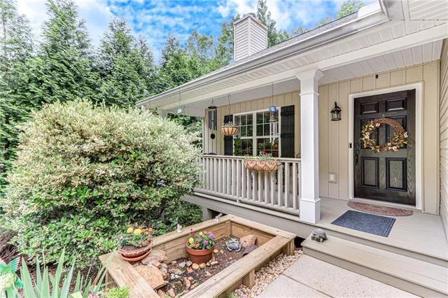 a view of a two chairs in the deck