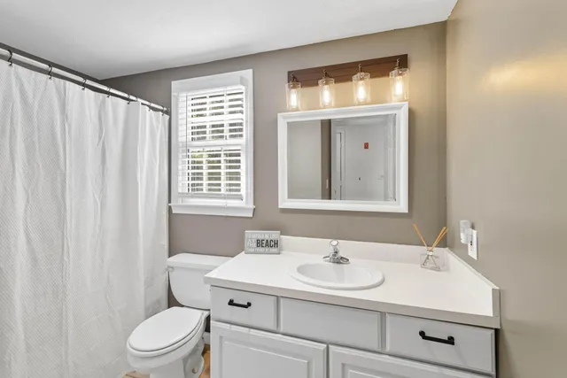 a view of balcony with yard