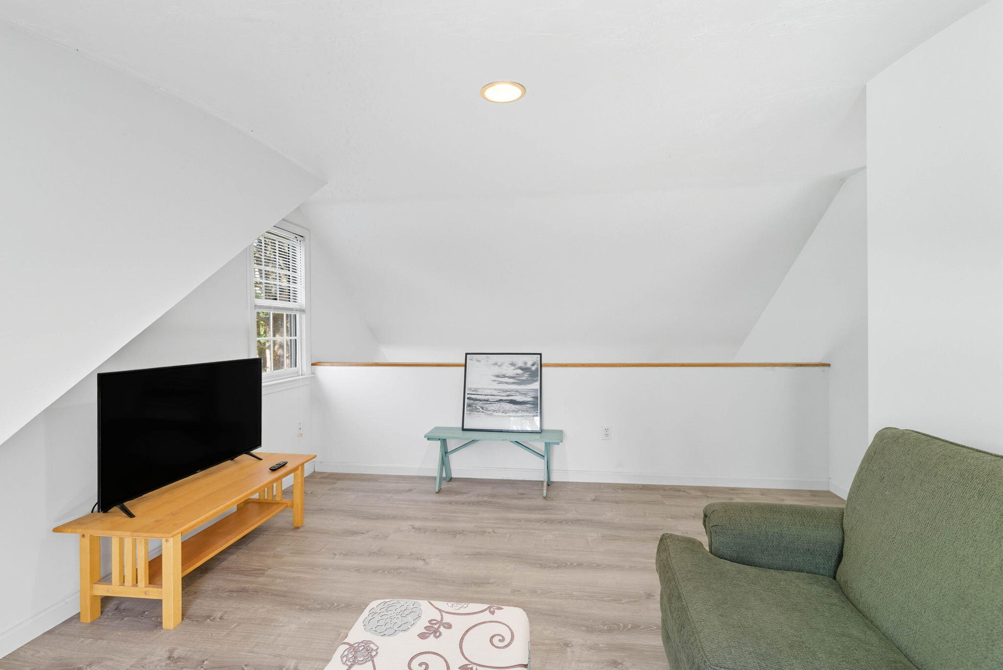20 Spring Lane Brewster, MA 02631 - Photo 27 of 56 a living room with furniture and a flat screen tv
