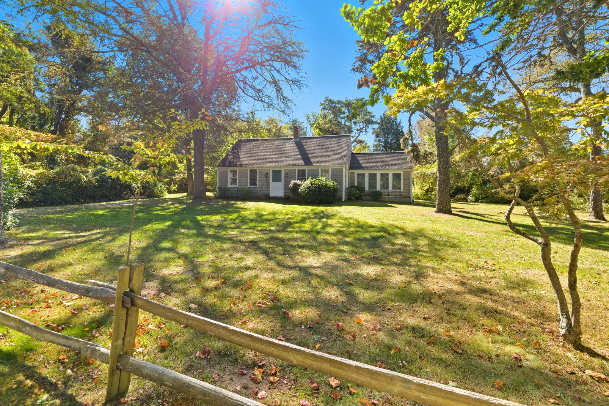 20 Spring Lane Brewster, MA 02631 - Photo 52 of 56 a view of a house with a yard