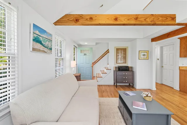 a living room with furniture and window