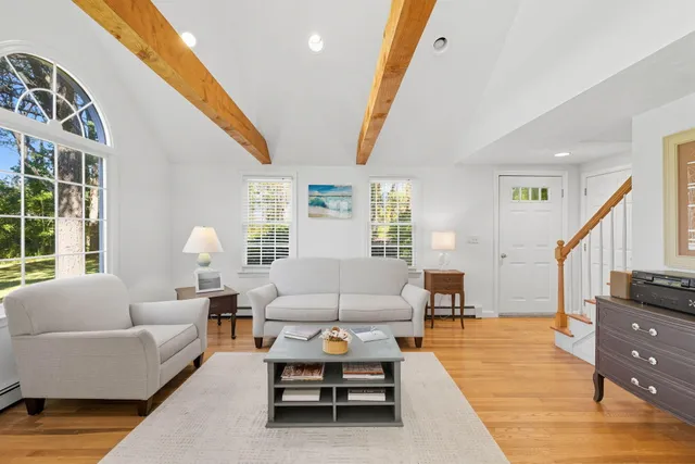a kitchen with stainless steel appliances granite countertop a stove and a refrigerator