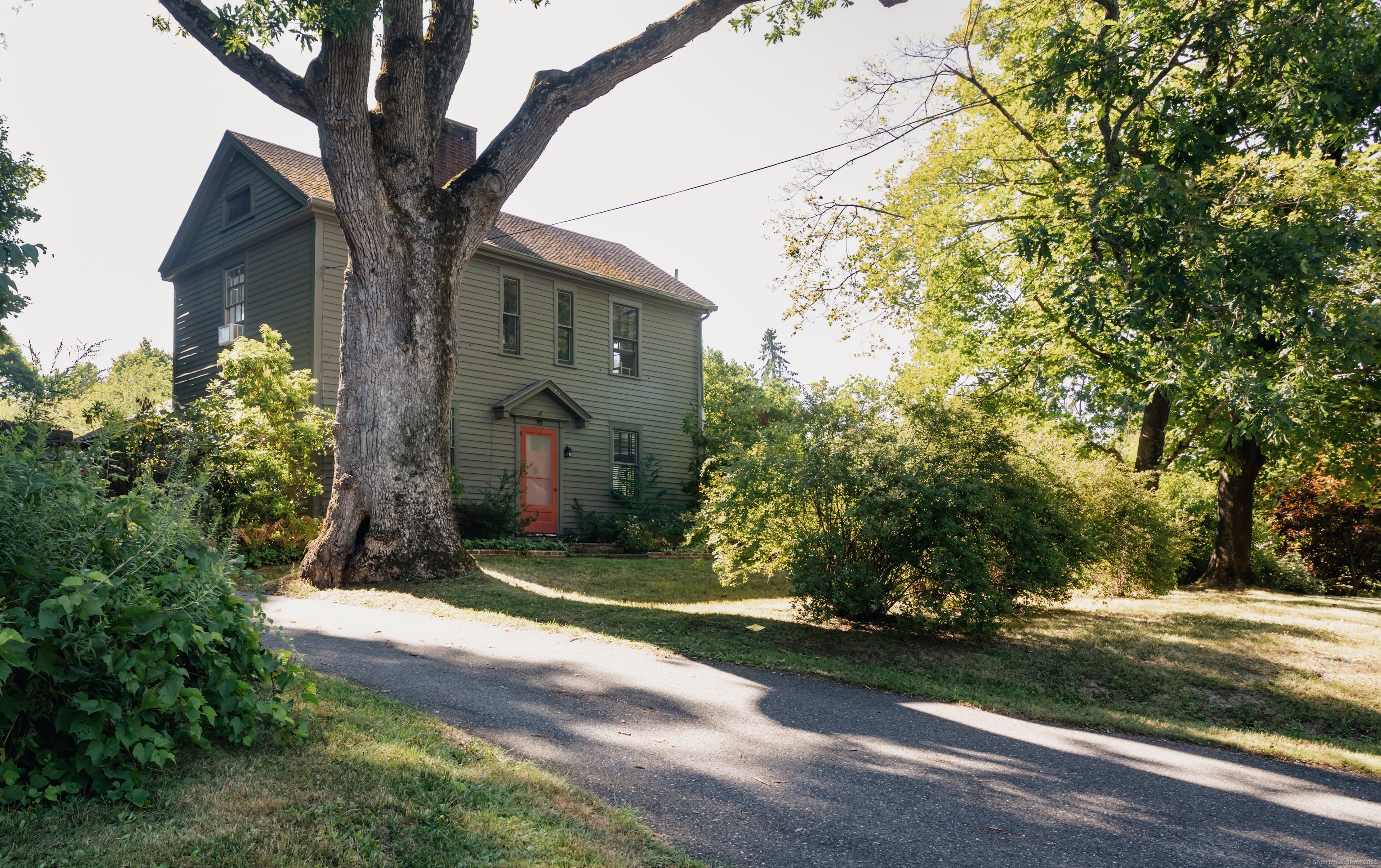 a front view of house with yard