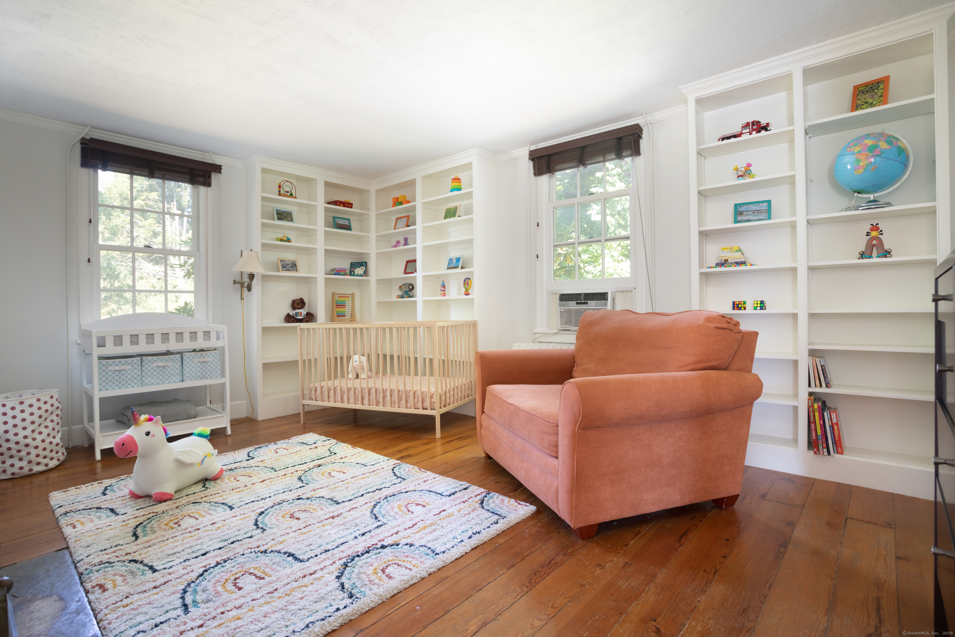 30 Indian Mountain Road Lakeville, CT 06039 - Photo 11 of 17 a bedroom with furniture and a wooden floor