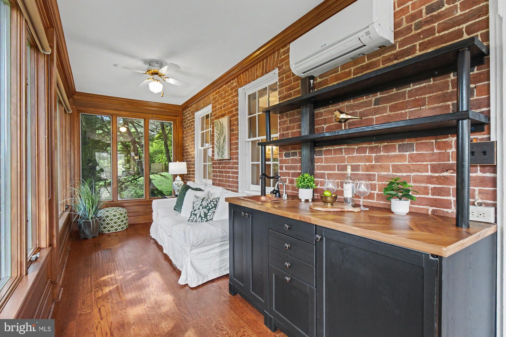 18535 Foreston Road Parkton, MD 21120 - Photo 14 of 101 Sunroom wet bar with refrigerator.