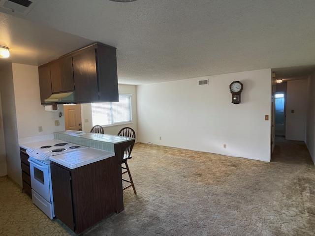 4200 Diamond Street, Unit 4 Capitola, CA 95010 - Photo 7 of 19 a kitchen with stainless steel appliances granite countertop a sink stove and cabinets