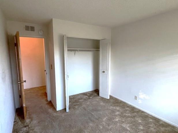 4200 Diamond Street, Unit 4 Capitola, CA 95010 - Photo 8 of 19 an empty room with windows