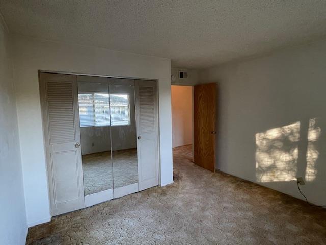 4200 Diamond Street, Unit 4 Capitola, CA 95010 - Photo 10 of 19 an empty room with windows