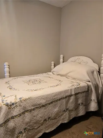 a bedroom with a bed
