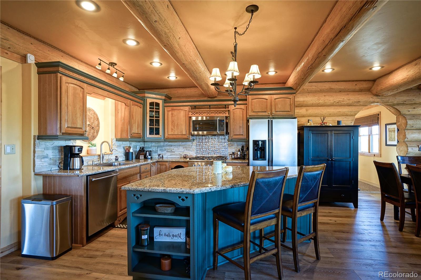 810 Mustang Road Rye, CO 81069 - Photo 14 of 50 a large kitchen with a table and chairs