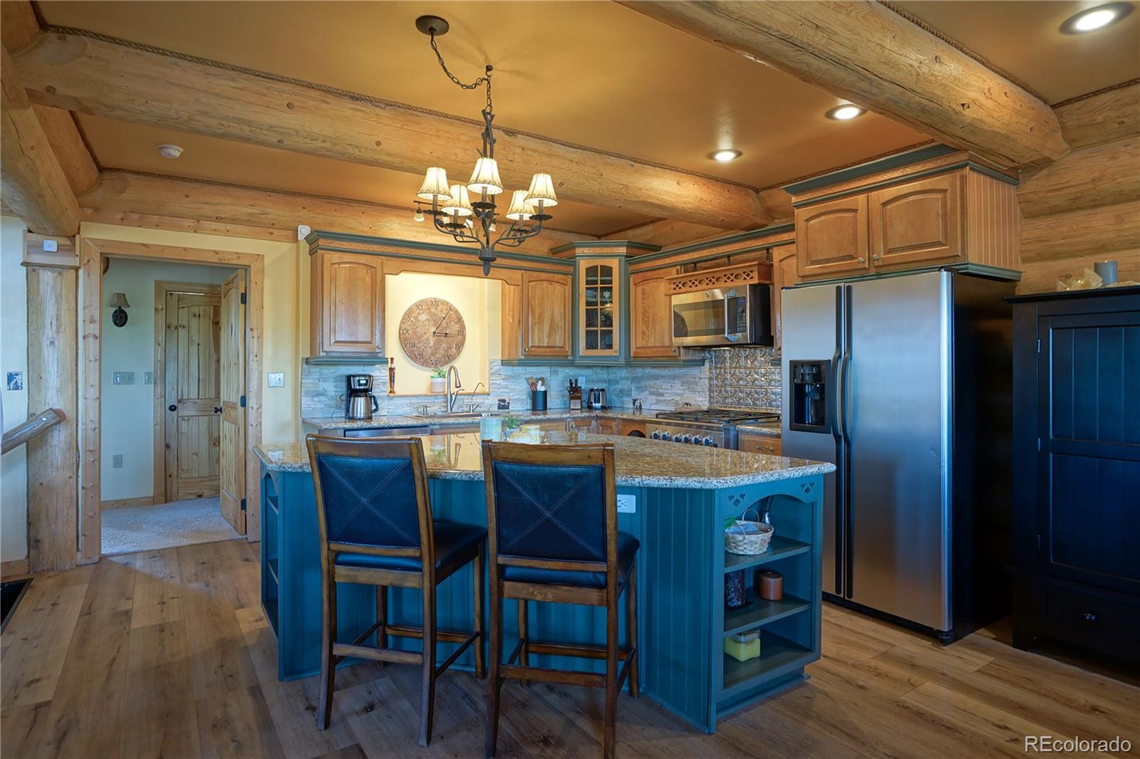 810 Mustang Road Rye, CO 81069 - Photo 16 of 50 a large kitchen with a table and chairs