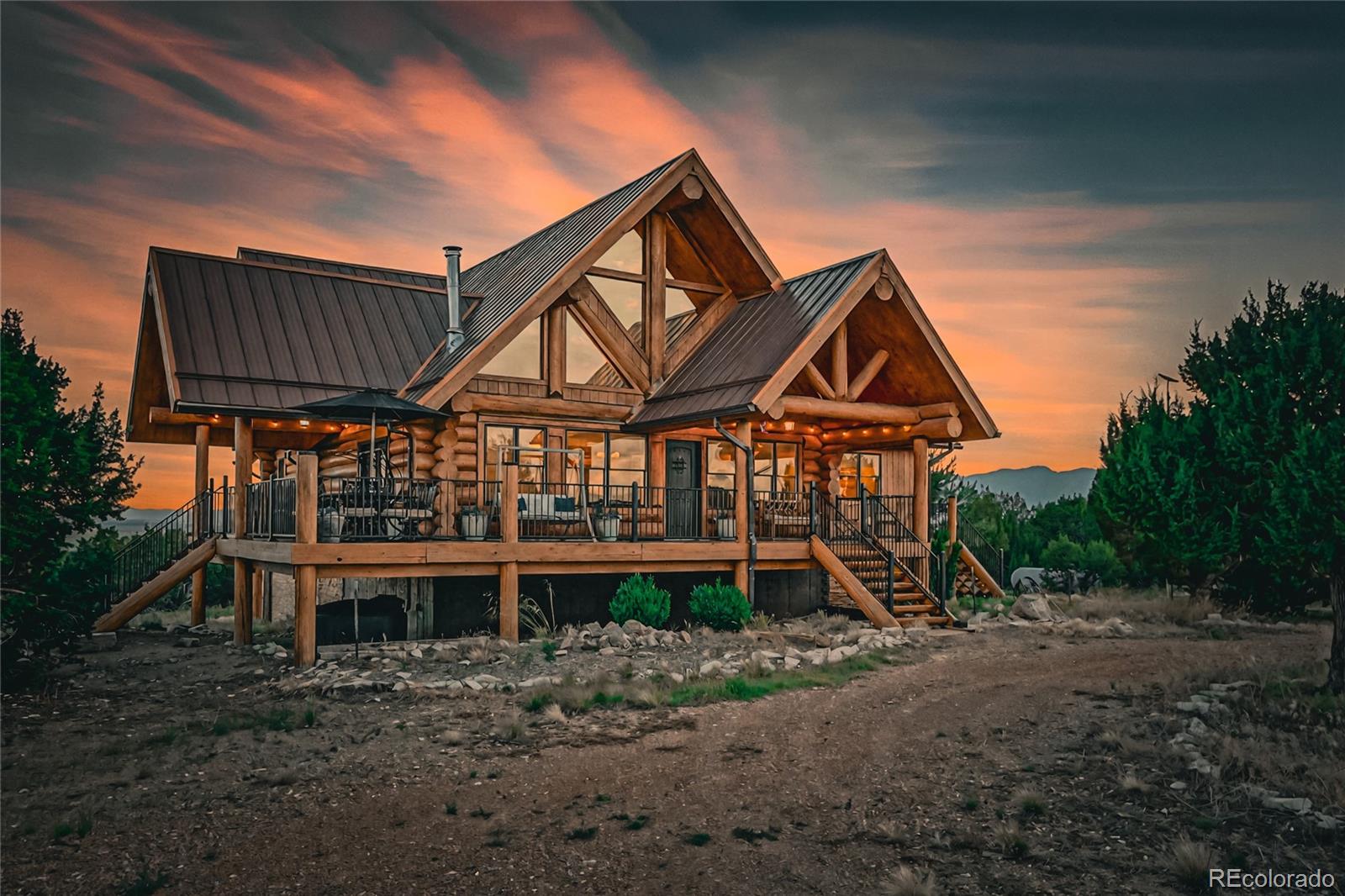 810 Mustang Road Rye, CO 81069 - Photo 2 of 50 a front view of a house with garden