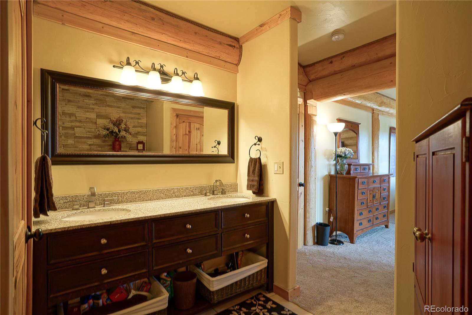 810 Mustang Road Rye, CO 81069 - Photo 23 of 50 a bathroom with a sink and a mirror