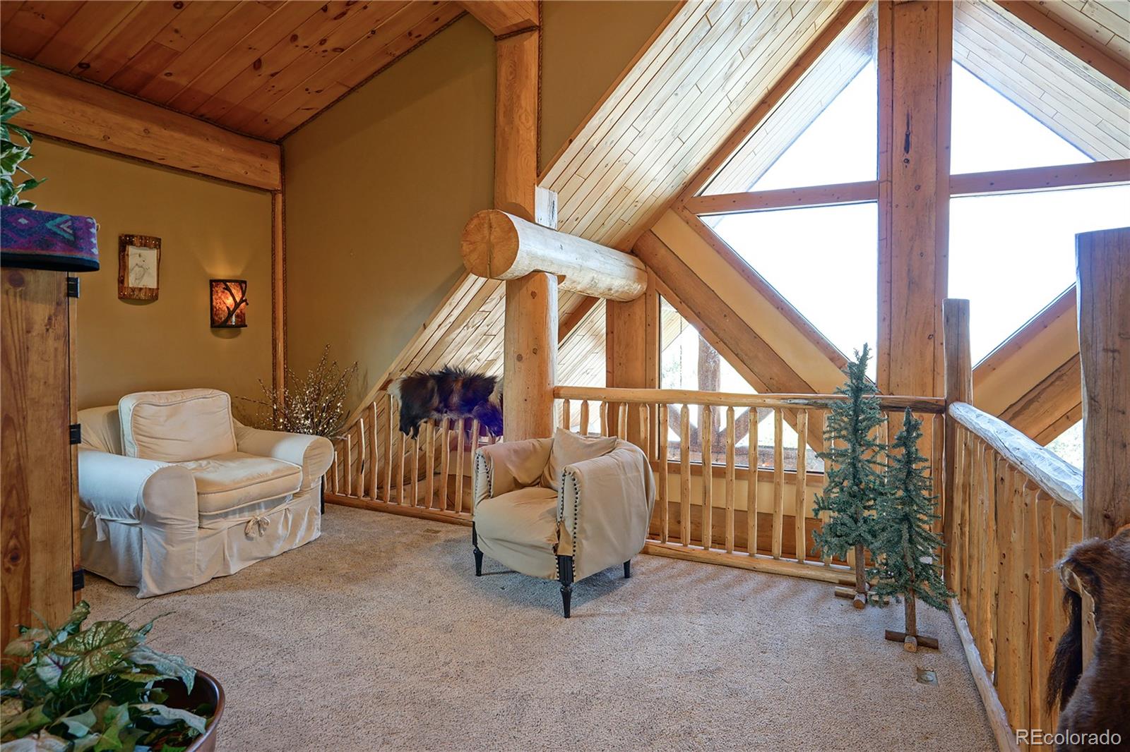 810 Mustang Road Rye, CO 81069 - Photo 26 of 50 a living room with furniture and a window