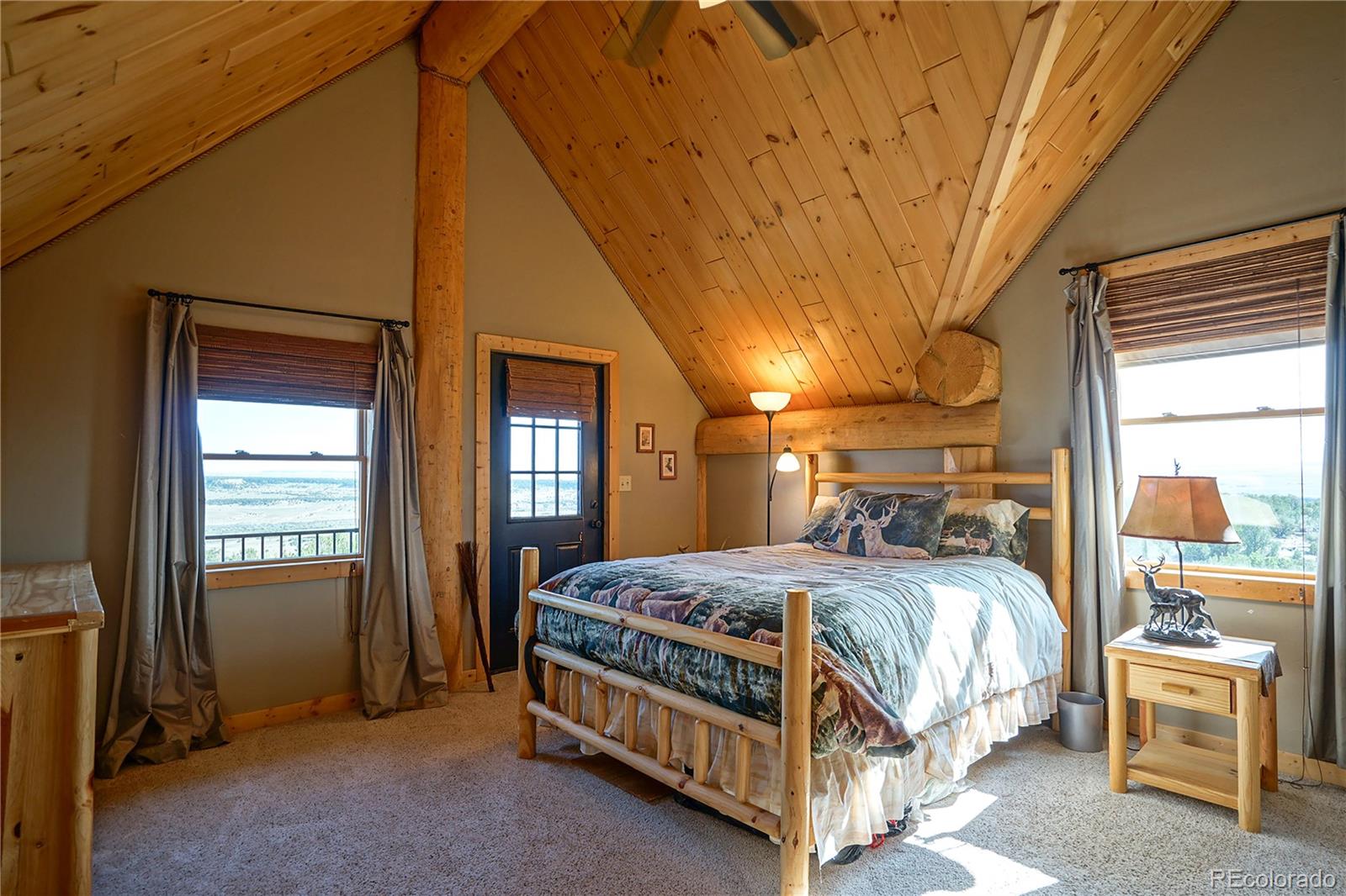 810 Mustang Road Rye, CO 81069 - Photo 30 of 50 a bedroom with a bed and a window