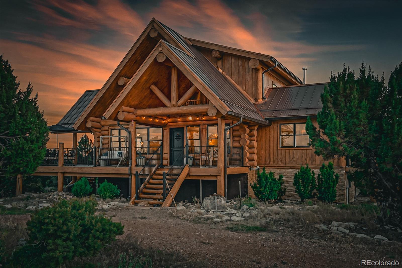 810 Mustang Road Rye, CO 81069 - Photo 3 of 50 a front view of a house with a yard