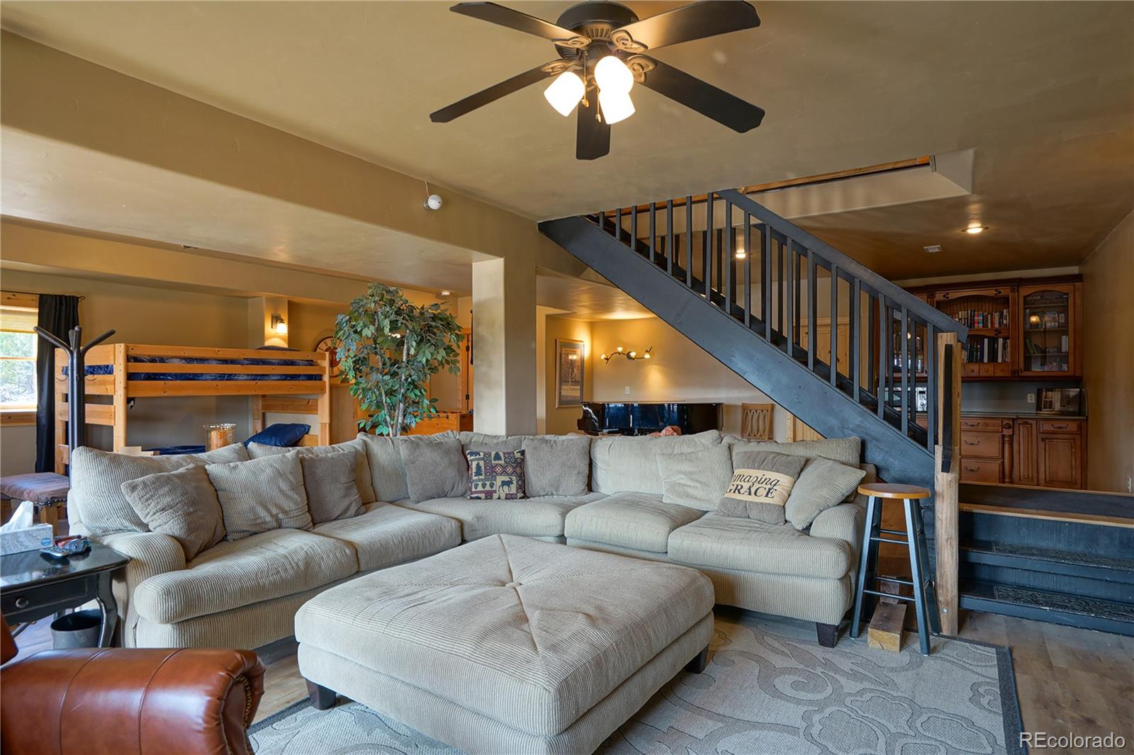 810 Mustang Road Rye, CO 81069 - Photo 34 of 50 a living room with furniture and a ceiling fan