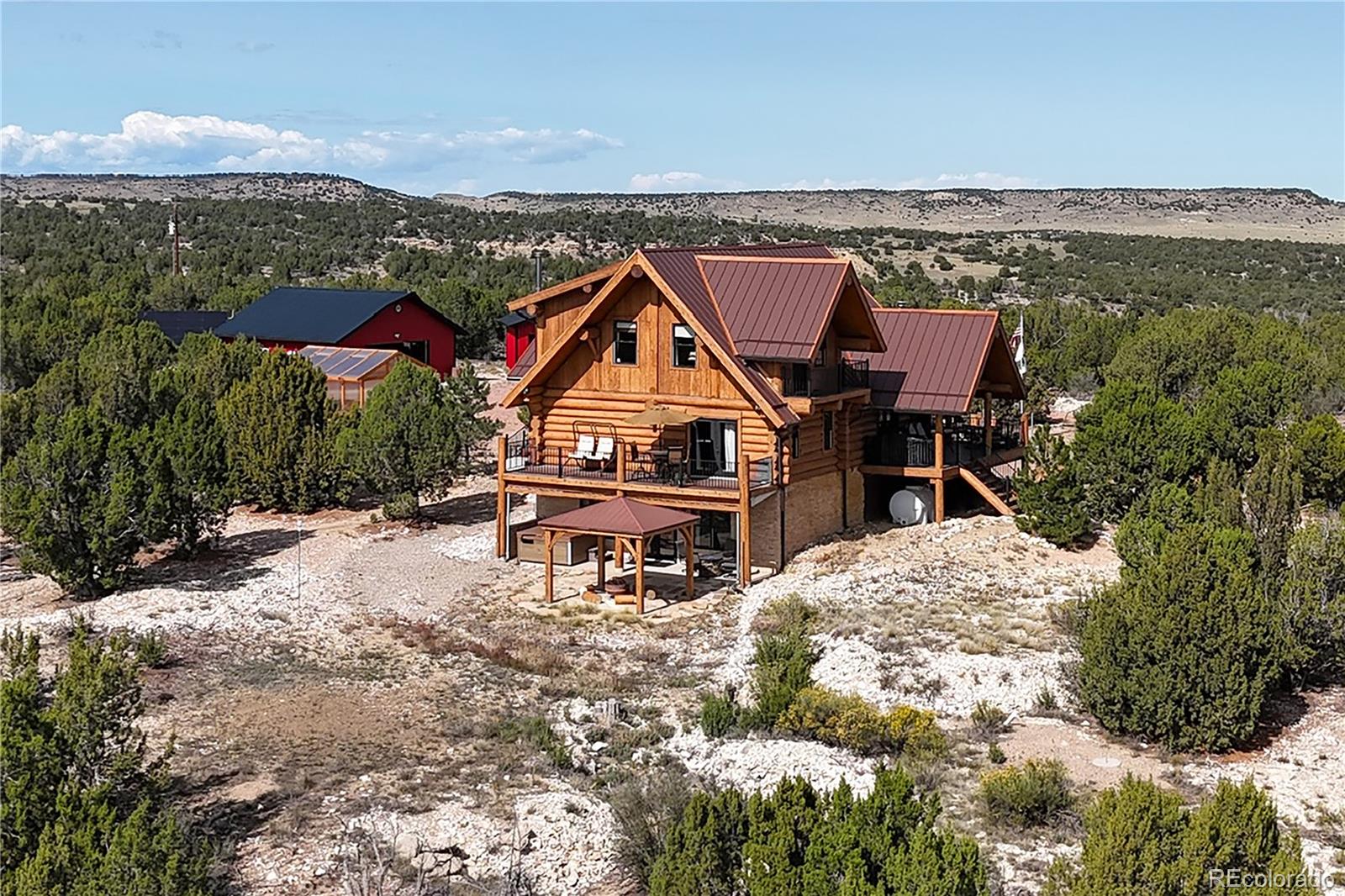 810 Mustang Road Rye, CO 81069 - Photo 45 of 50 an aerial view of a house with a mountain view