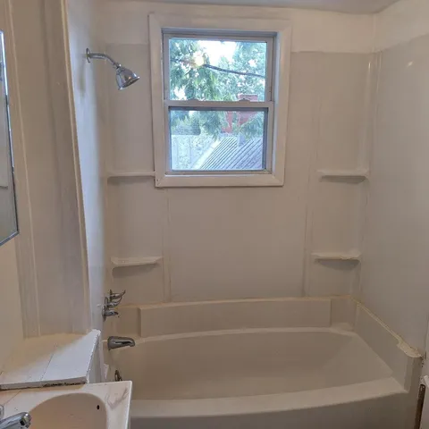 a bathroom with a bathtub