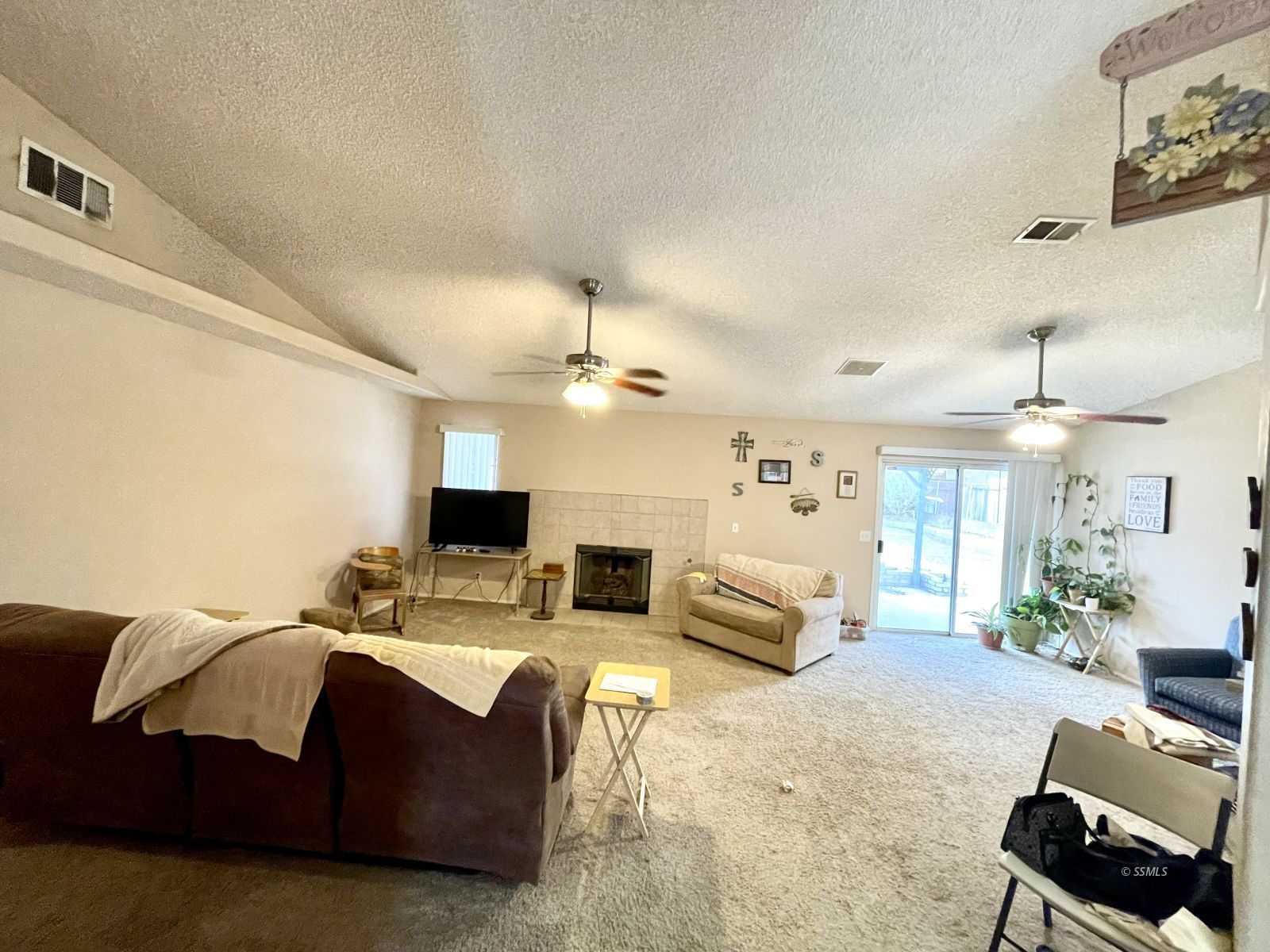 529 South Allen Street Ridgecrest, CA 93555 - Photo 6 of 17 a living room with furniture and a flat screen tv
