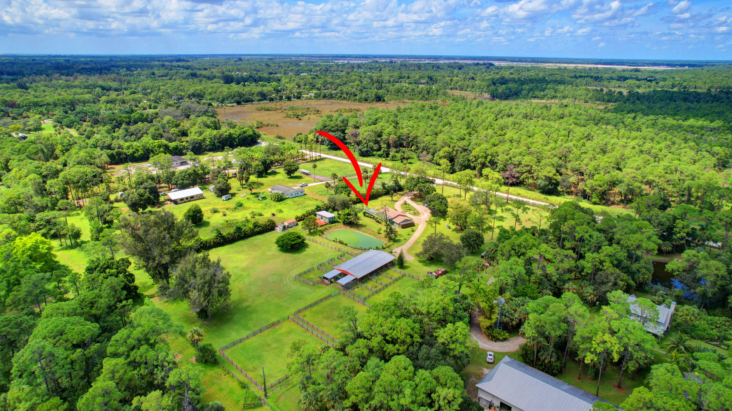13598 N Road Loxahatchee Groves, FL 33470 - Photo 9 of 87 09_house air (9)