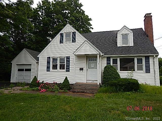 319 Wells Road Wethersfield, CT 06109 - Photo 1 of 1 a front view of a house with a garden