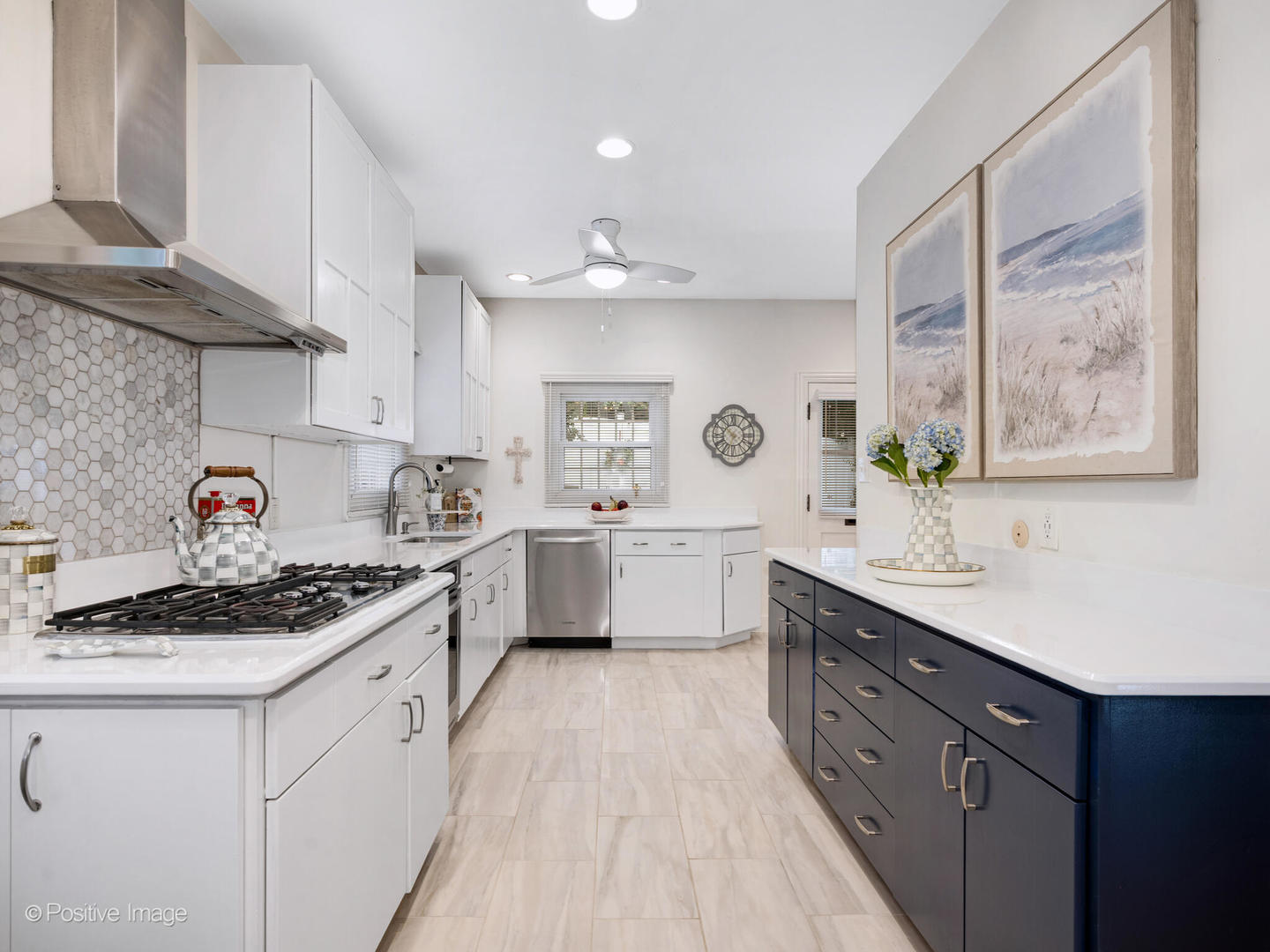 317 East Walnut Street Hinsdale, IL 60521 - Photo 16 of 38 a kitchen with stainless steel appliances a sink stove and cabinets
