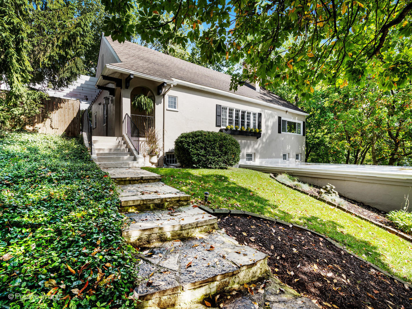 317 East Walnut Street Hinsdale, IL 60521 - Photo 2 of 38 a view of a house with backyard and sitting area