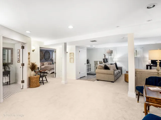 a living room with furniture and a couch