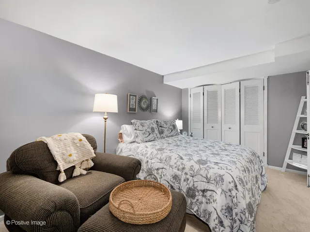 a living room with a bed and furniture