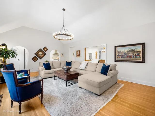 a living room with furniture and a table
