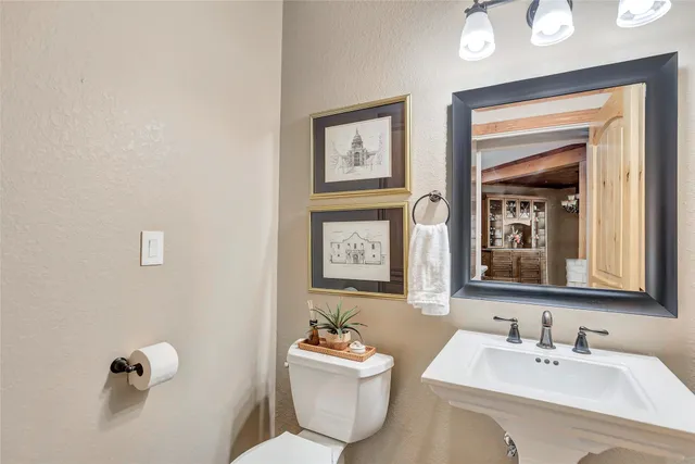 a bedroom with a bed couch and window