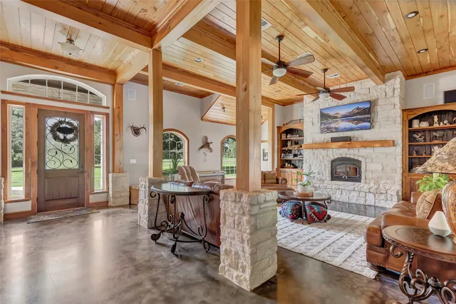 a room with lots of table and chairs