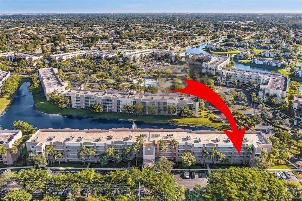 an aerial view of a houses with outdoor space