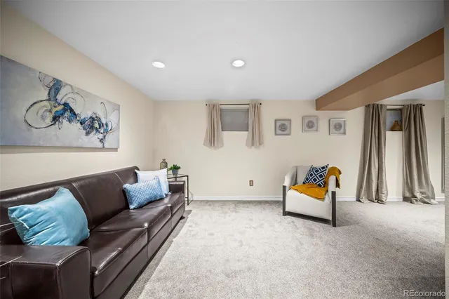 a living room with furniture and a couch