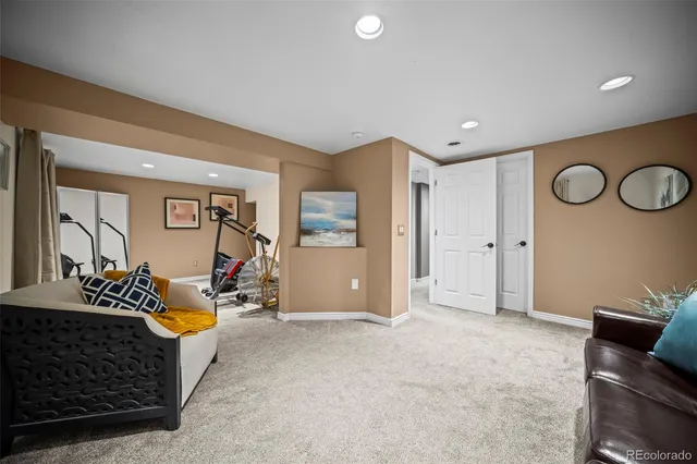 a view of room with furniture and air hockey table