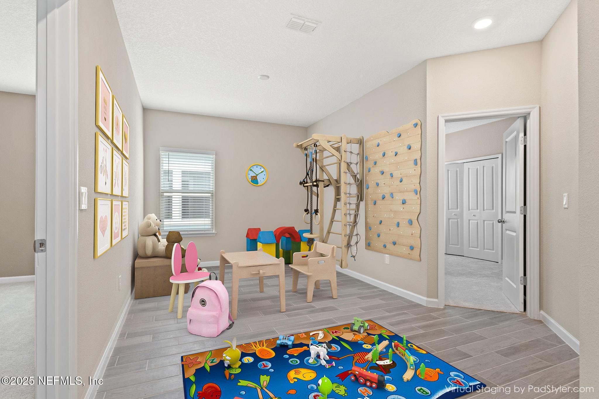 911 Colon Lane Jacksonville, FL 32218 - Photo 20 of 32 a living room with furniture and a table