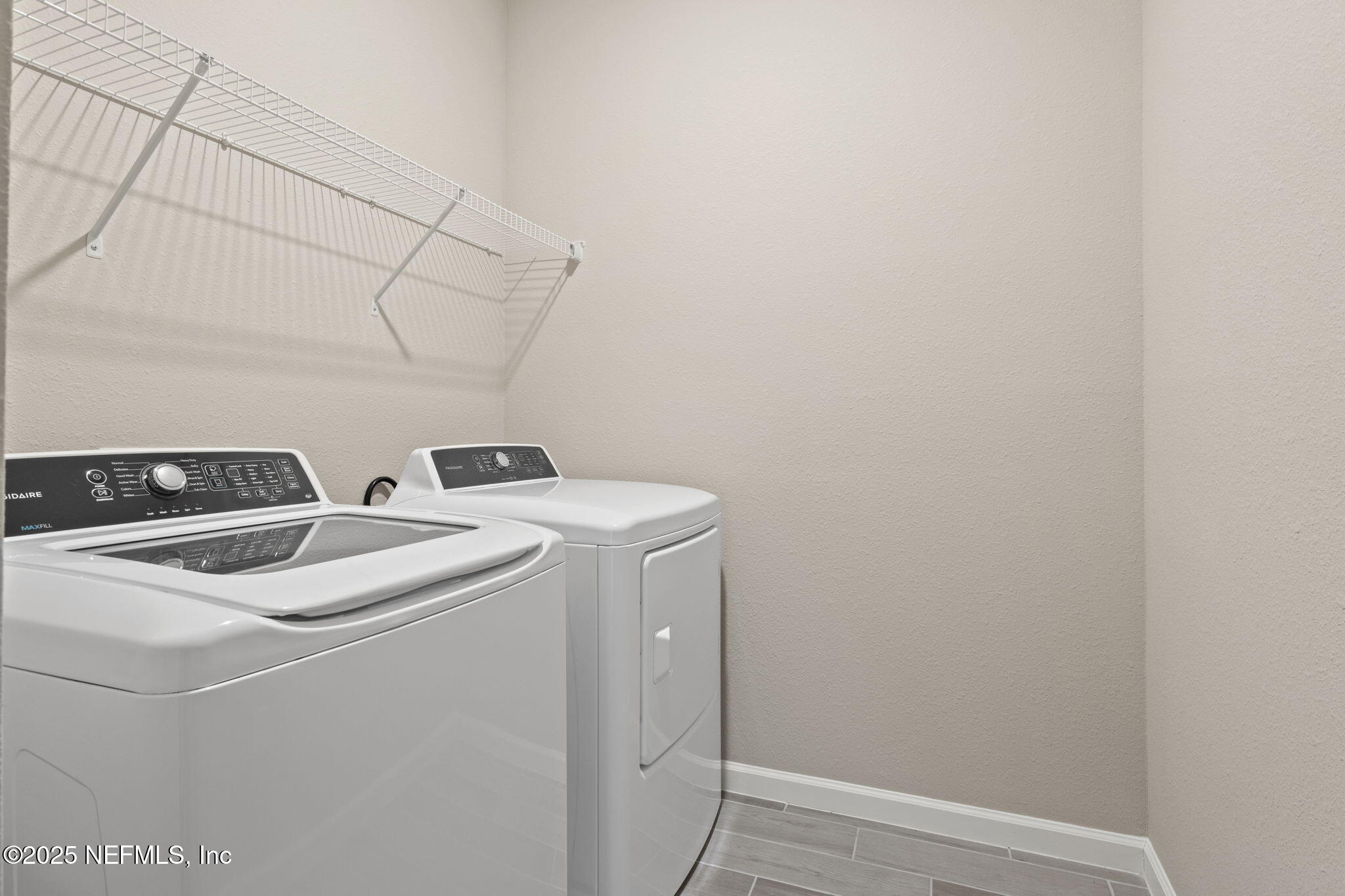 911 Colon Lane Jacksonville, FL 32218 - Photo 28 of 32 a utility room with dryer and washer
