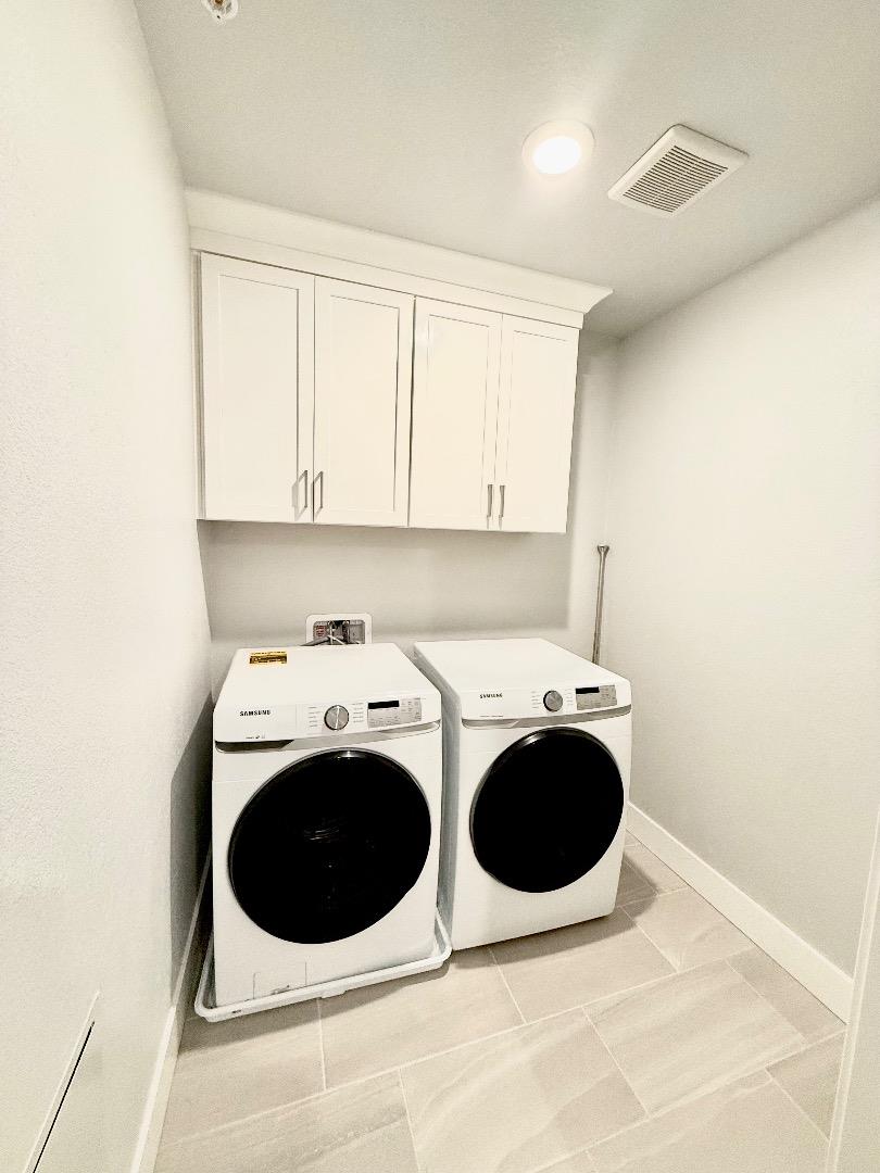 1661 Spring Street, Unit 424 Davis, CA 95616 - Photo 12 of 34 a utility room with dryer and washer