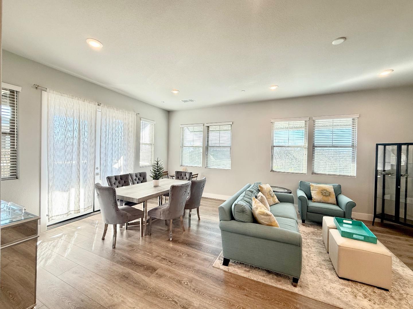 1661 Spring Street, Unit 424 Davis, CA 95616 - Photo 2 of 34 a living room with furniture and a window