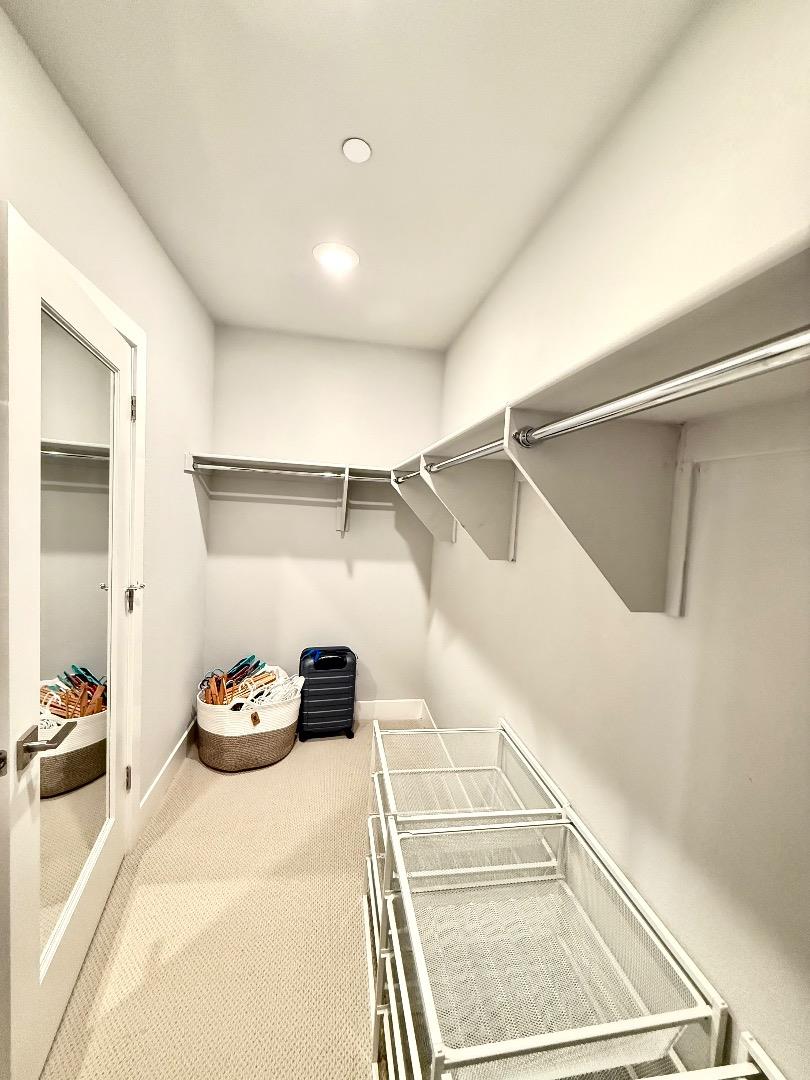 1661 Spring Street, Unit 424 Davis, CA 95616 - Photo 27 of 34 a bedroom with a bed and a window