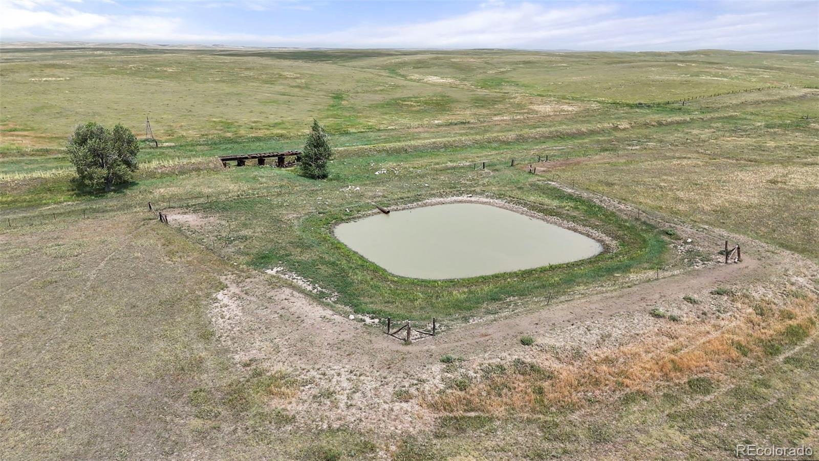 0 Resolis Road Matheson, CO 80830 - Photo 3 of 50 a view of a lake with a yard