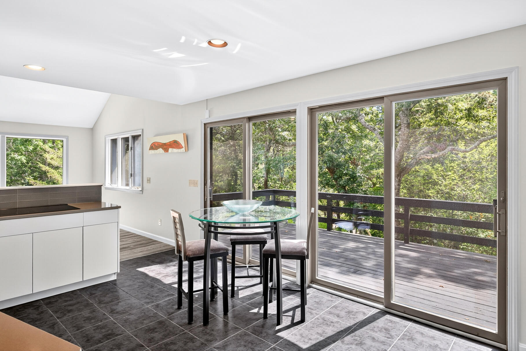 7 Fishermans Road Truro, MA 02666 - Photo 14 of 42 a view of a dining room with furniture window and outside view