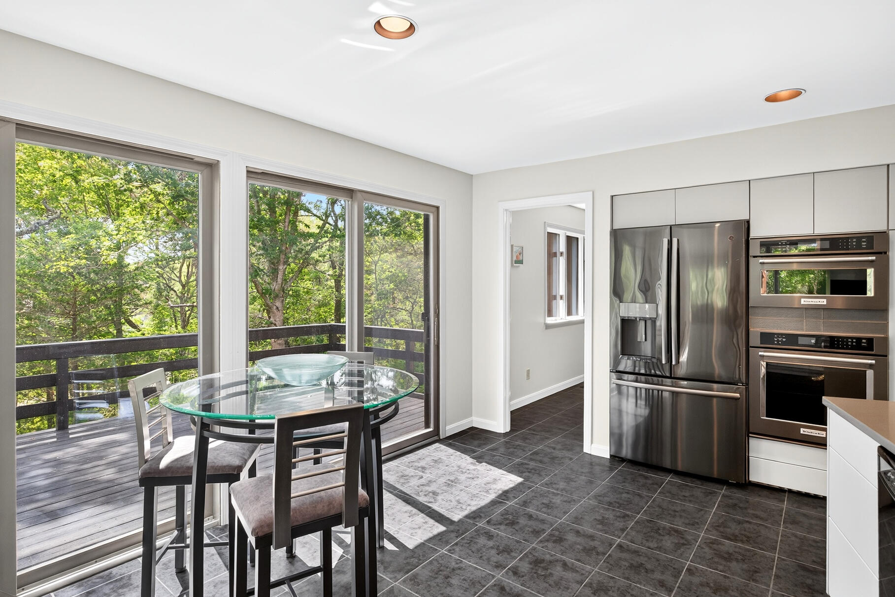 7 Fishermans Road Truro, MA 02666 - Photo 17 of 42 a kitchen with a table and refrigerator