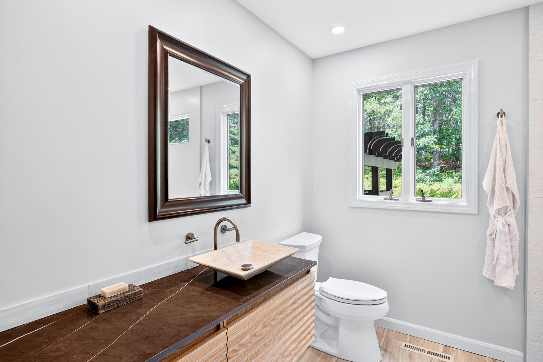 7 Fishermans Road Truro, MA 02666 - Photo 21 of 42 a bathroom with a granite countertop sink toilet and mirror