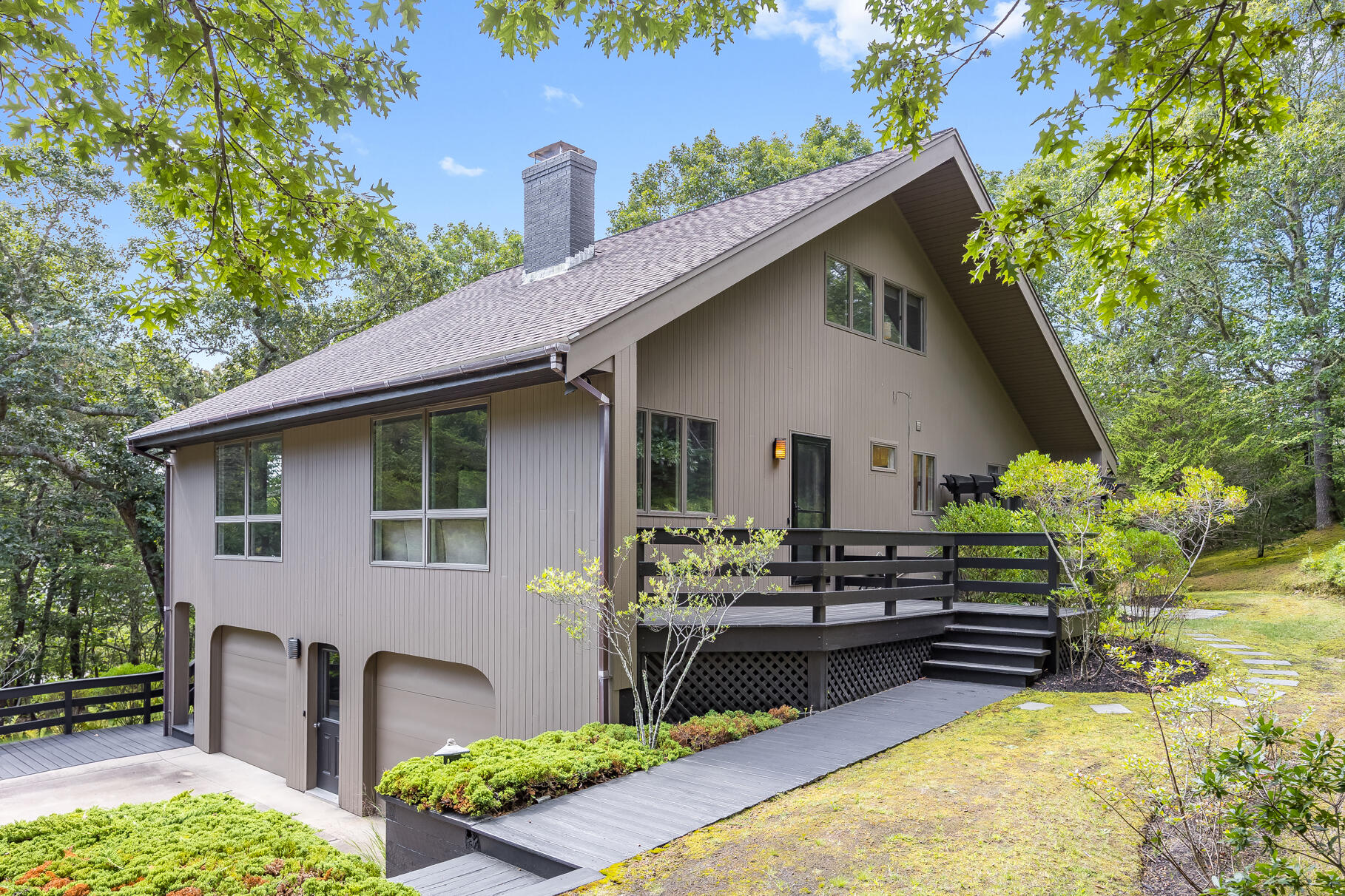 7 Fishermans Road Truro, MA 02666 - Photo 34 of 42 a view of a house with backyard and sitting area