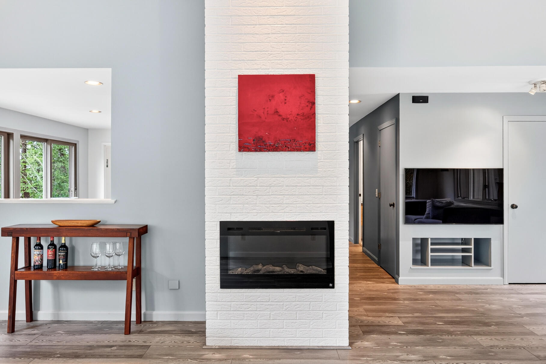 7 Fishermans Road Truro, MA 02666 - Photo 7 of 42 a view of a livingroom with an empty space and a fireplace