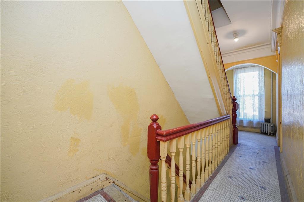1122 39th Street Brooklyn, NY 11218 - Photo 11 of 27 a view of a hallway