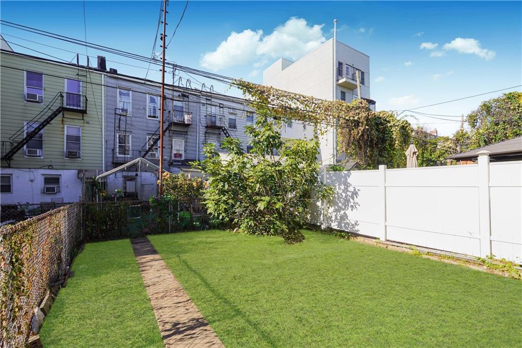 1122 39th Street Brooklyn, NY 11218 - Photo 15 of 27 a view of a back yard