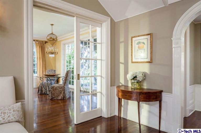 445 Prospect Square Pasadena, CA 91103 - Photo 12 of 45 a hallway with wooden floor and furniture